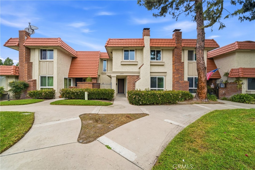 Located just steps from greenbelts and community amenities. - 11717 Garden Grove Boulevard, Garden Grove CA 92843 - photo 1