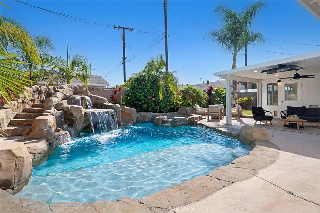 Tropical Backyard with newer pool, waterfall, slide and colored lights - 11782 Jasper Street, Garden Grove CA 92845 - photo 32