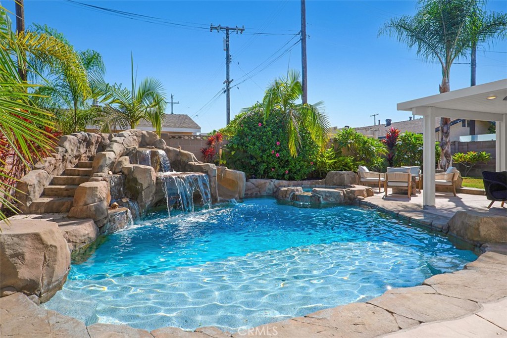 Tropical Backyard with newer pool, waterfall, slide and colored lights - 11782 Jasper Street, Garden Grove CA 92845 - photo 36
