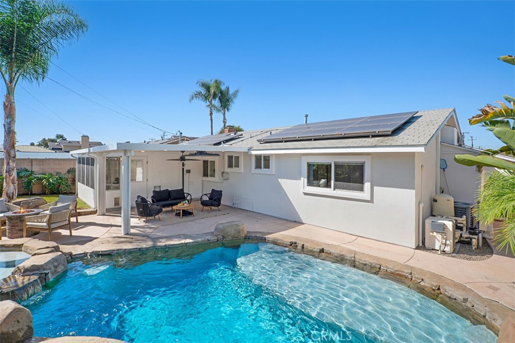 Tropical Backyard with newer pool, waterfall, slide and colored lights - 11782 Jasper Street, Garden Grove CA 92845 - photo 41