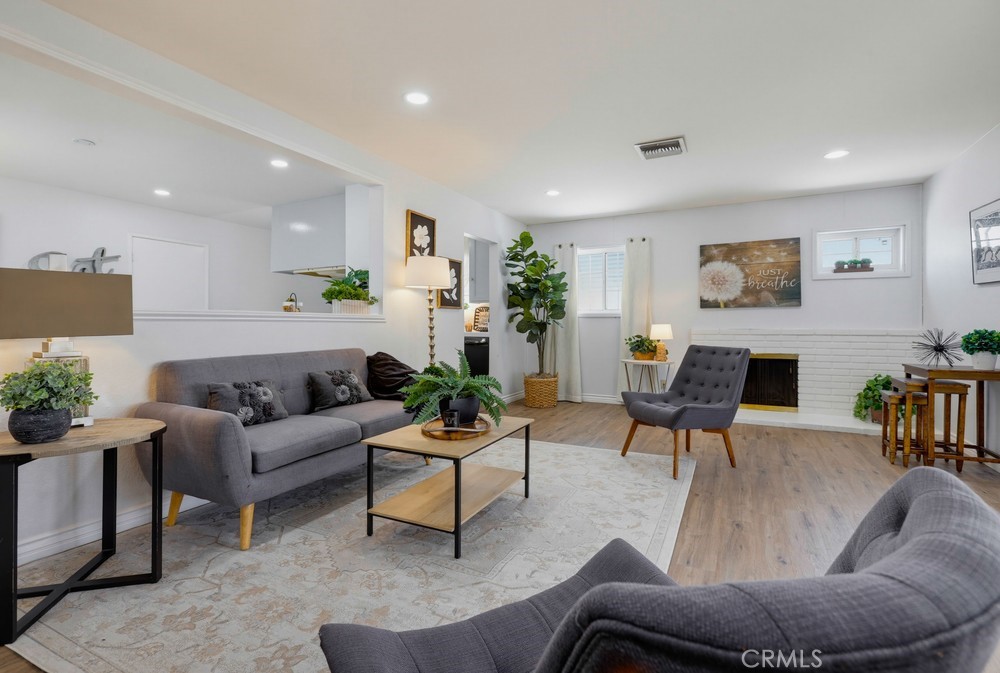 Full living room and fireplace - 11841 Garnet, Garden Grove CA 92845 - photo 16