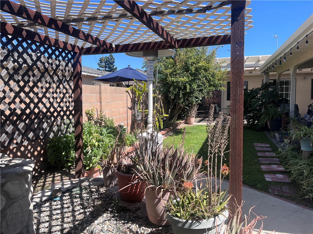 Covered patio and fountain area - 12581 Cardinal Avenue, Garden Grove CA 92843 - photo 7