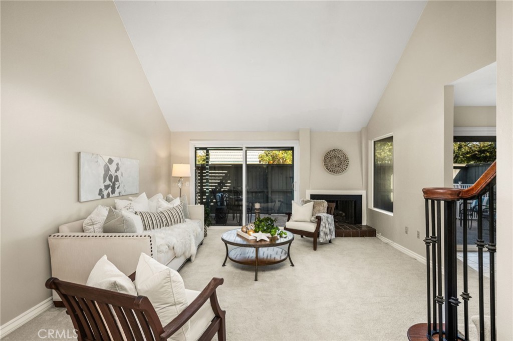 A spacious entry opens to the light-filled living room, offering an inviting first impression. - 12632 Romaine Wy, Garden Grove CA 92845 - photo 3