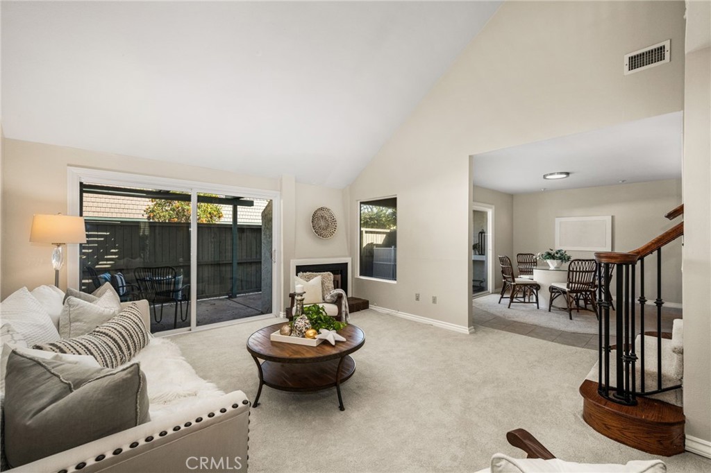 Comfortable living with easy access to the patio and adjoining kitchen and dining area. - 12632 Romaine Wy, Garden Grove CA 92845 - photo 5