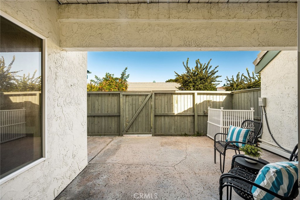 Enjoy dining beside the patio, with sliding doors bringing in natural light and outdoor views. - 12632 Romaine Wy, Garden Grove CA 92845 - photo 22