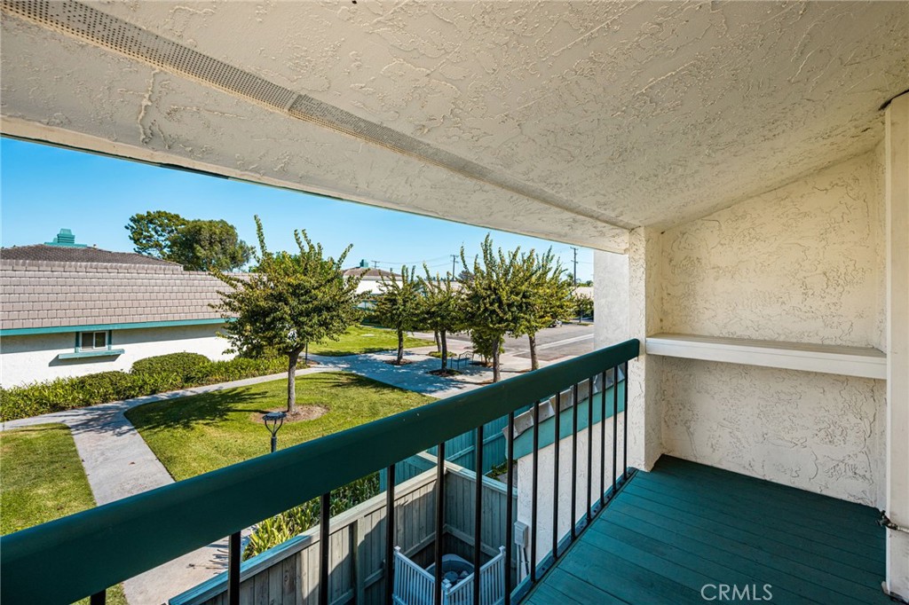 Enjoy natural light and peaceful greenbelt views from the comfort of the primary bedroom. - 12632 Romaine Wy, Garden Grove CA 92845 - photo 36