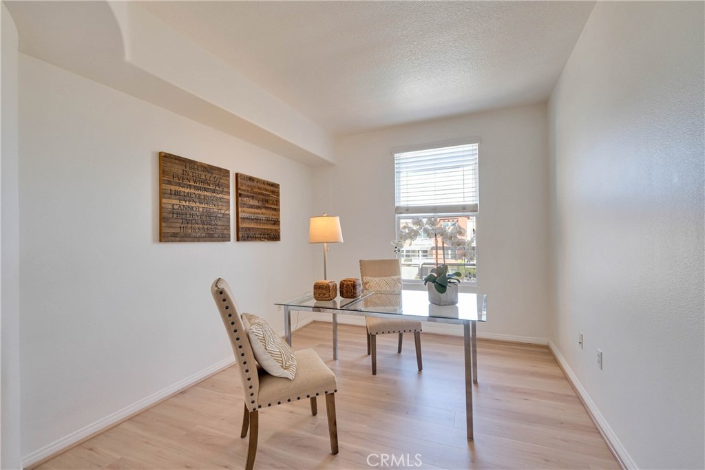 2nd bedroom dressed as an office along the hallway - 12664 Chapman Avenue 1402, Garden Grove CA 92840 - photo 21