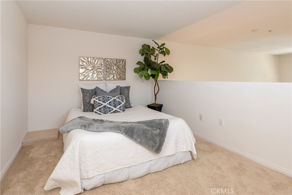 Loft area dressed as a bedroom - 12664 Chapman Avenue 1402, Garden Grove CA 92840 - photo 26