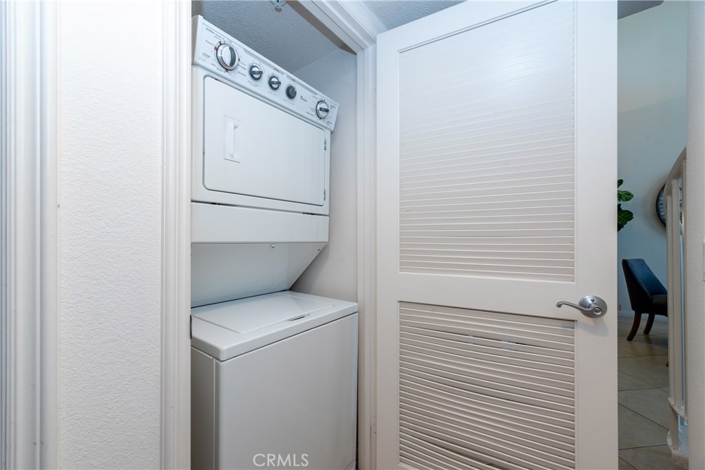 In-unit stacked washer and dryer area - 12664 Chapman Avenue 1402, Garden Grove CA 92840 - photo 28