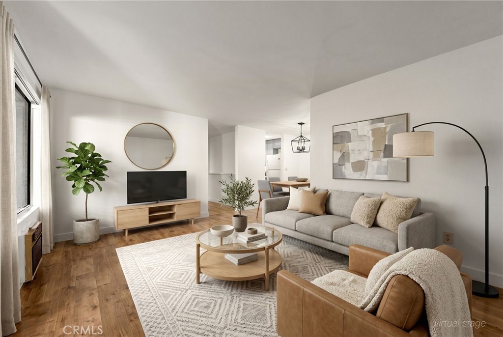 Digitally altered image: Living Room - 13100 Gilbert Street 35, Garden Grove CA 92844 - photo 1