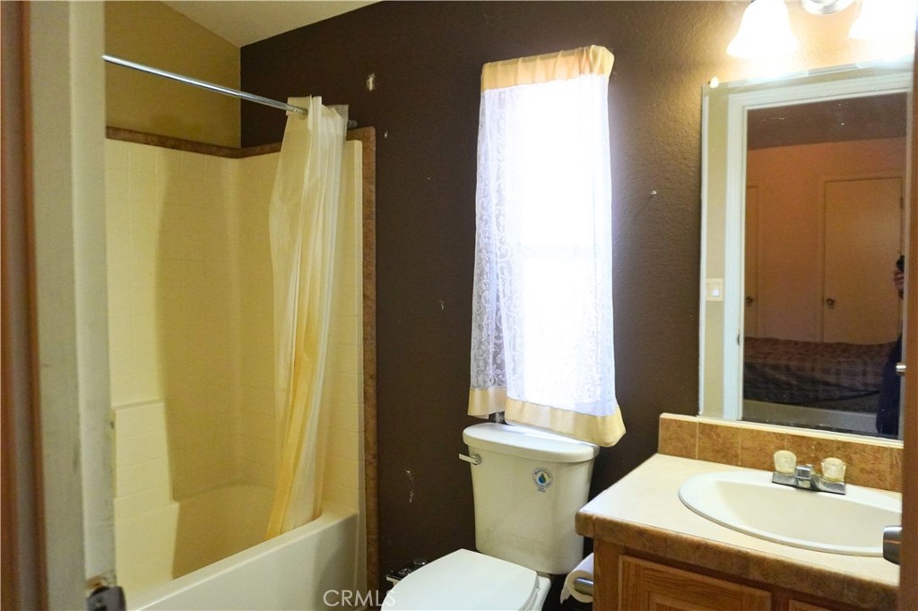 Bathroom 1. - 13102 Partridge Space 13, Garden Grove CA 92843 - photo 9