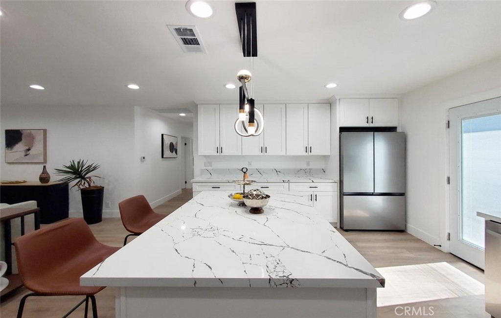 Main house- kitchen - 13392 Laramore, Garden Grove CA 92843 - photo 11