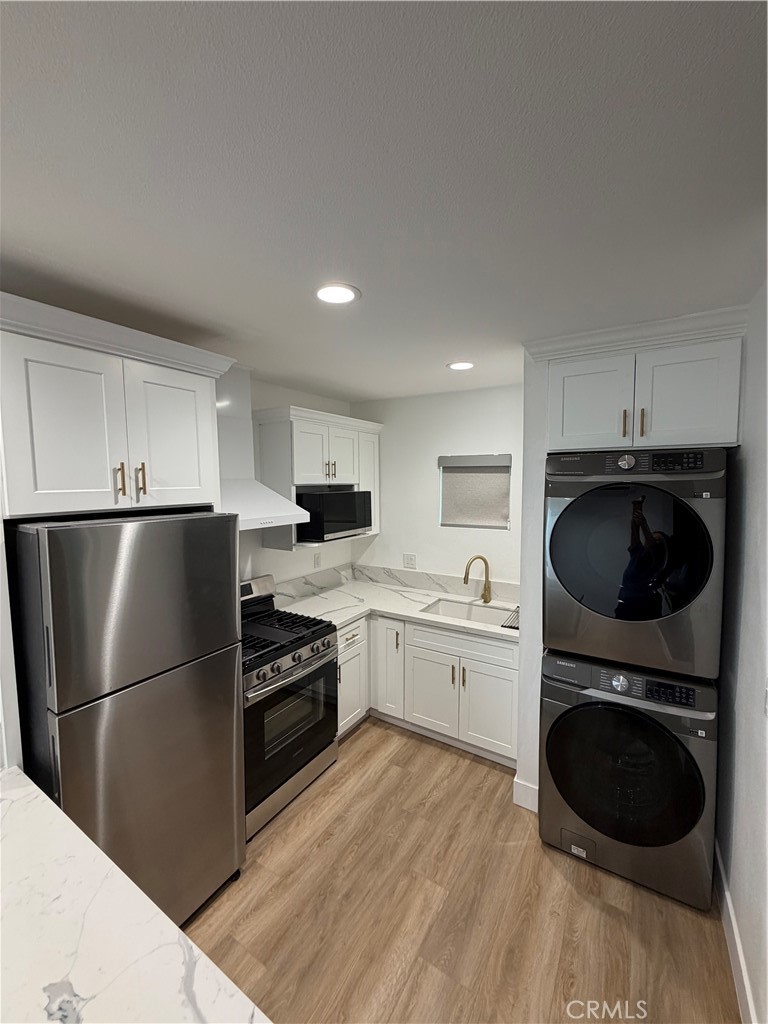 Attached ADU Laramore- Kitchen & Washer Dryer Stackable area - 13392 Laramore, Garden Grove CA 92843 - photo 44