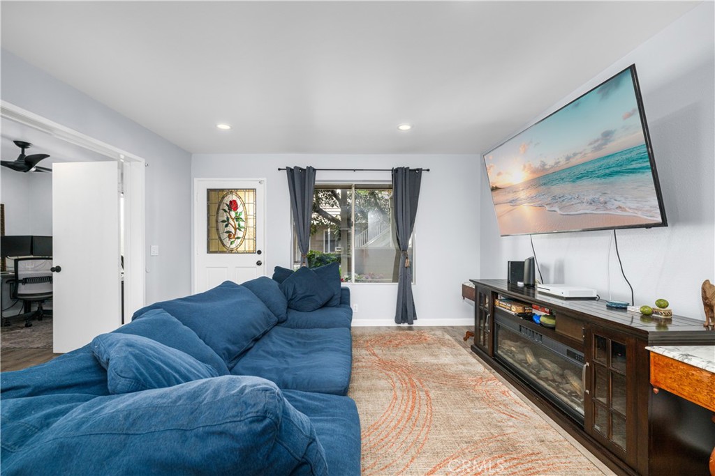 View of living rom, onleft is 2nd bedroom used as office - 6971 Knollcrest #48 48, Garden Grove CA 92845 - photo 12