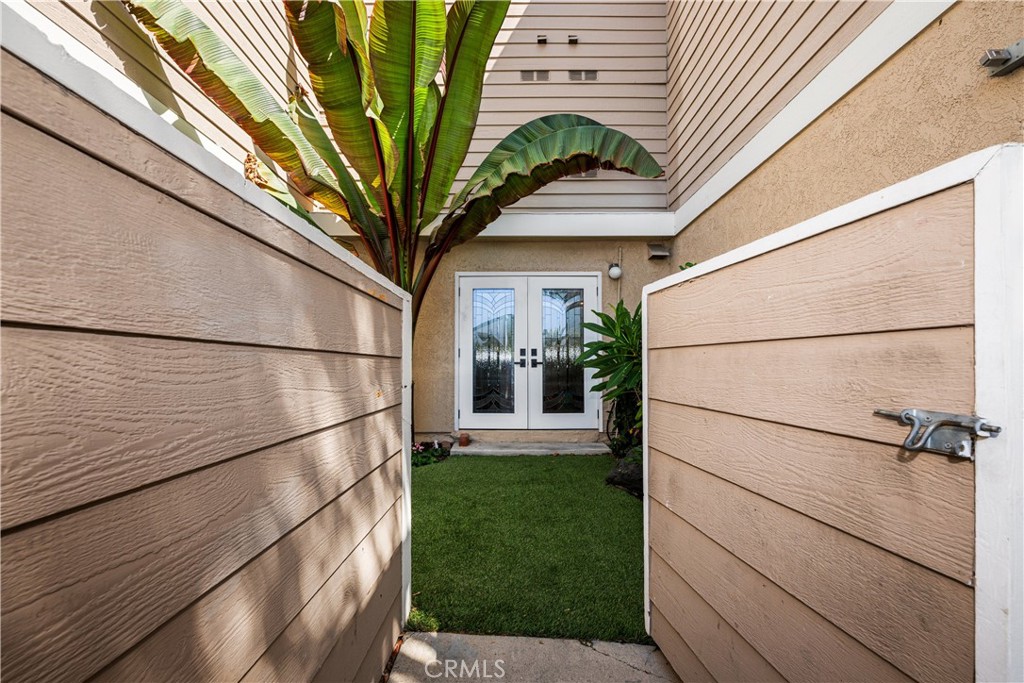 View of stained glass frinch doors from back patio - 6971 Knollcrest #48 48, Garden Grove CA 92845 - photo 25