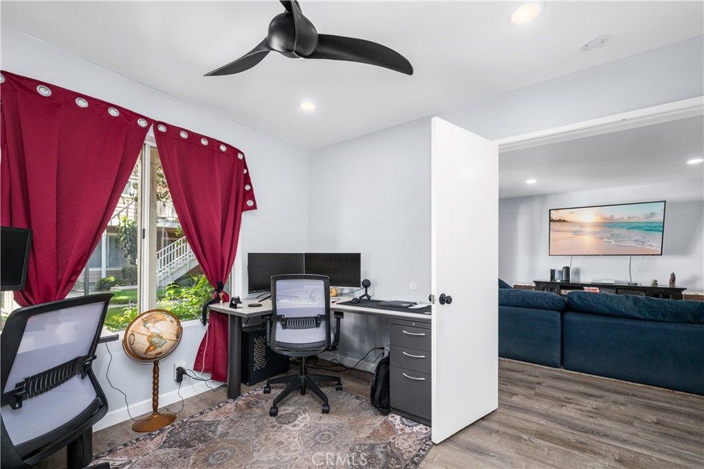 Bedroom being used as office into living room. - 6971 Knollcrest #48 48, Garden Grove CA 92845 - photo 28