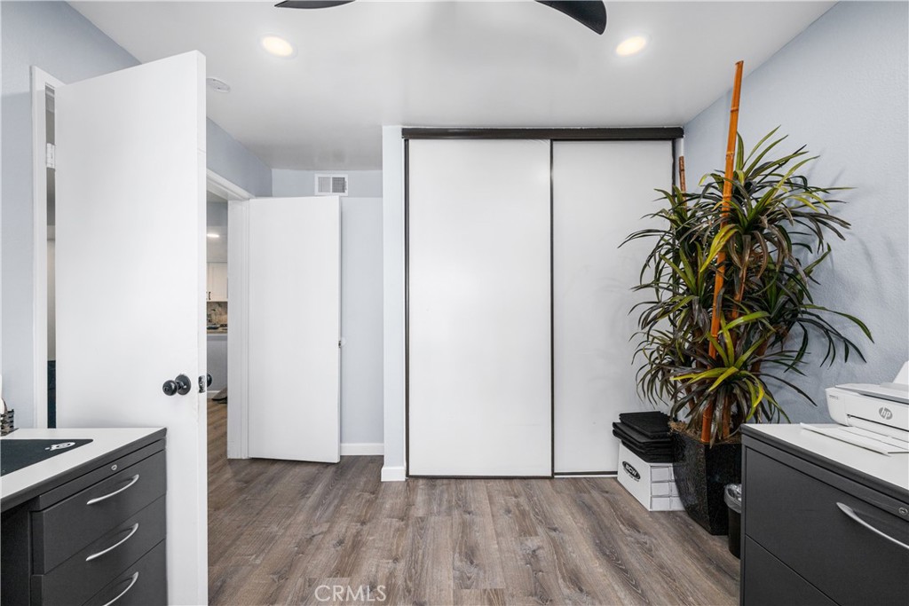 Closet in bedroom used as office. Doors on. left into living room - 6971 Knollcrest #48 48, Garden Grove CA 92845 - photo 30