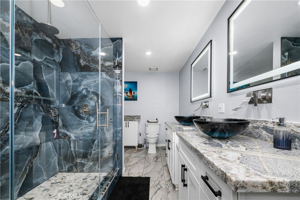 Primary Bath. Custom Shower with two shower heads, couble sinks, custom mirrors - 6971 Knollcrest #48 48, Garden Grove CA 92845 - photo 44