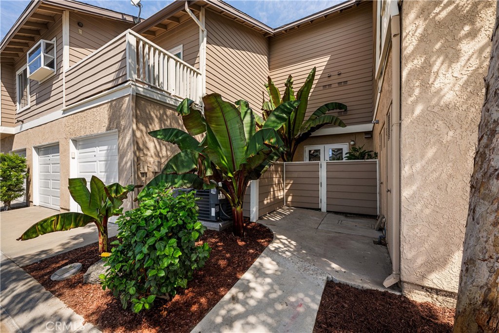 Plants in back by garage. Entry into back patio - 6971 Knollcrest #48 48, Garden Grove CA 92845 - photo 57