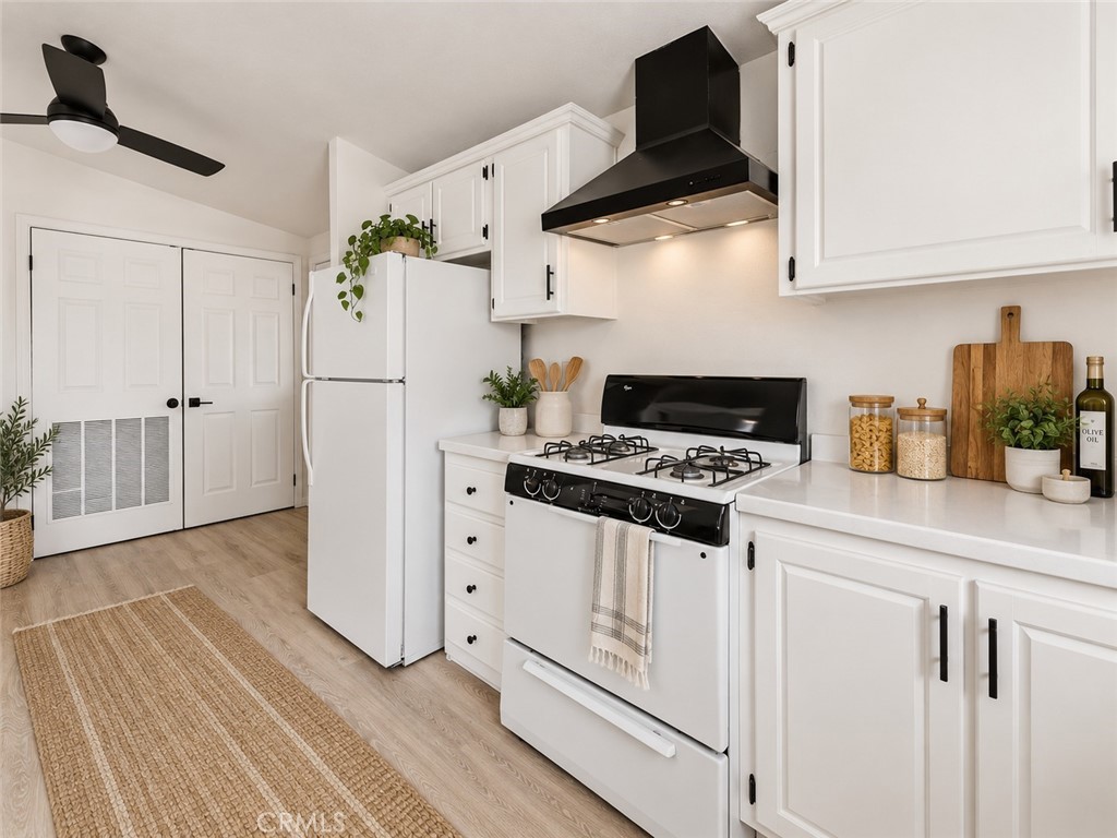 Kitchen stove area - 7887 Lampson Ave Avenue 10, Garden Grove CA 92841 - photo 7