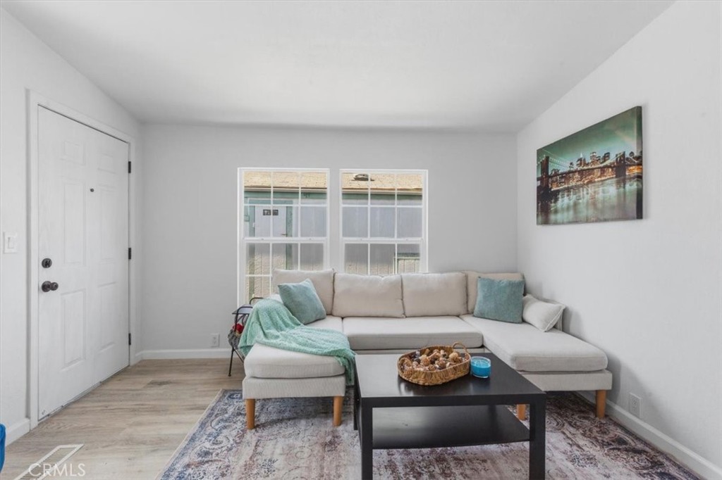 Living Room - 7887 Lampson Ave Avenue 10, Garden Grove CA 92841 - photo 10