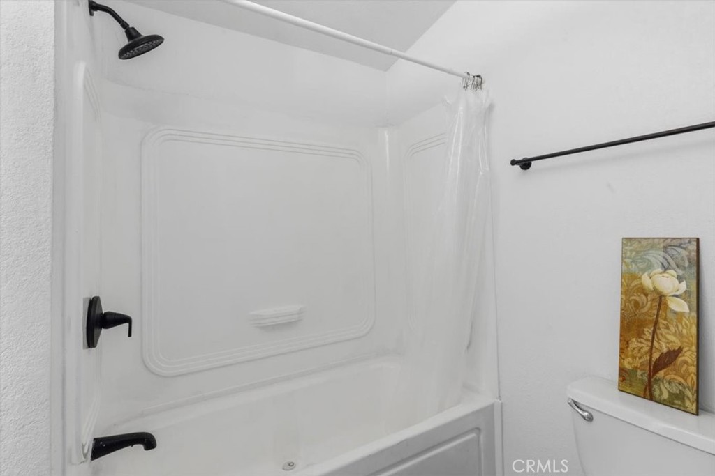 Bathroom with Shower and Tub - 7887 Lampson Ave Avenue 10, Garden Grove CA 92841 - photo 15