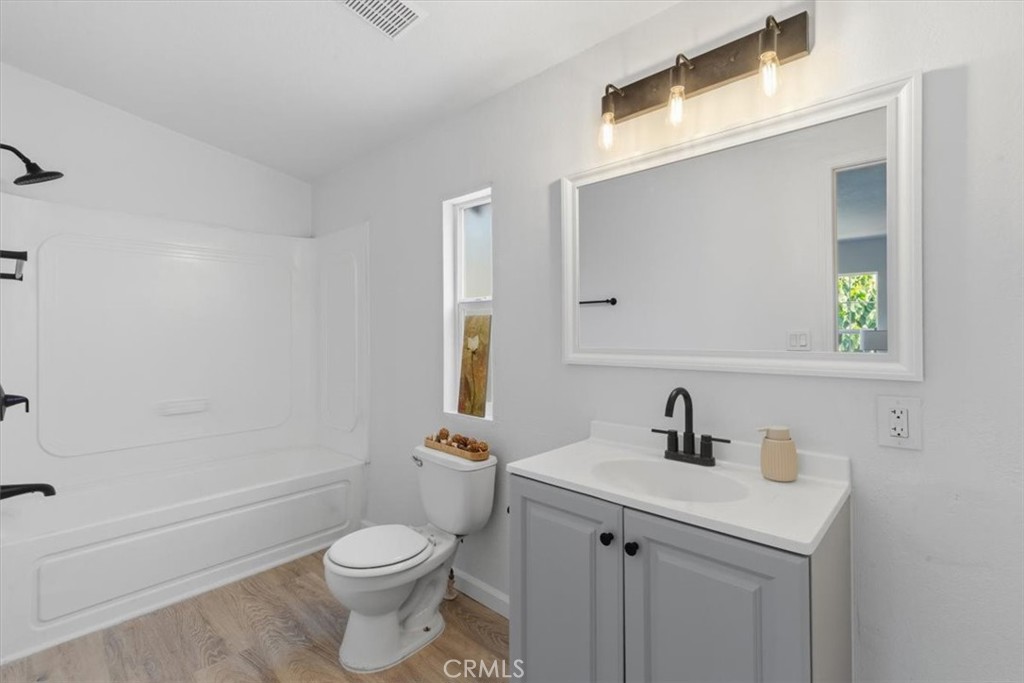 Bathroom with Shower and Tub - 7887 Lampson Ave Avenue 10, Garden Grove CA 92841 - photo 19