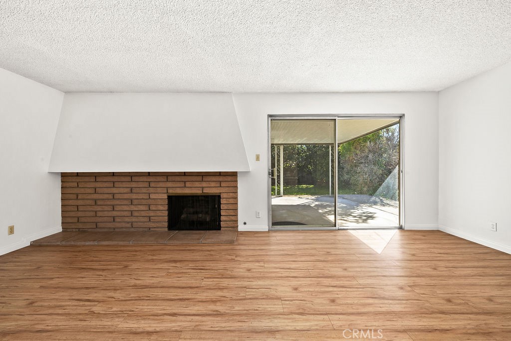 Living Room with Fireplace - 9652 Mansor Avenue, Garden Grove CA 92844 - photo 7