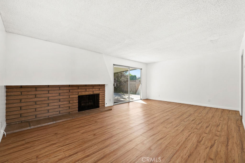 Living Room with Fireplace - 9652 Mansor Avenue, Garden Grove CA 92844 - photo 8