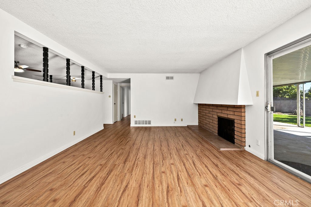 Living Room with Fireplace - 9652 Mansor Avenue, Garden Grove CA 92844 - photo 12