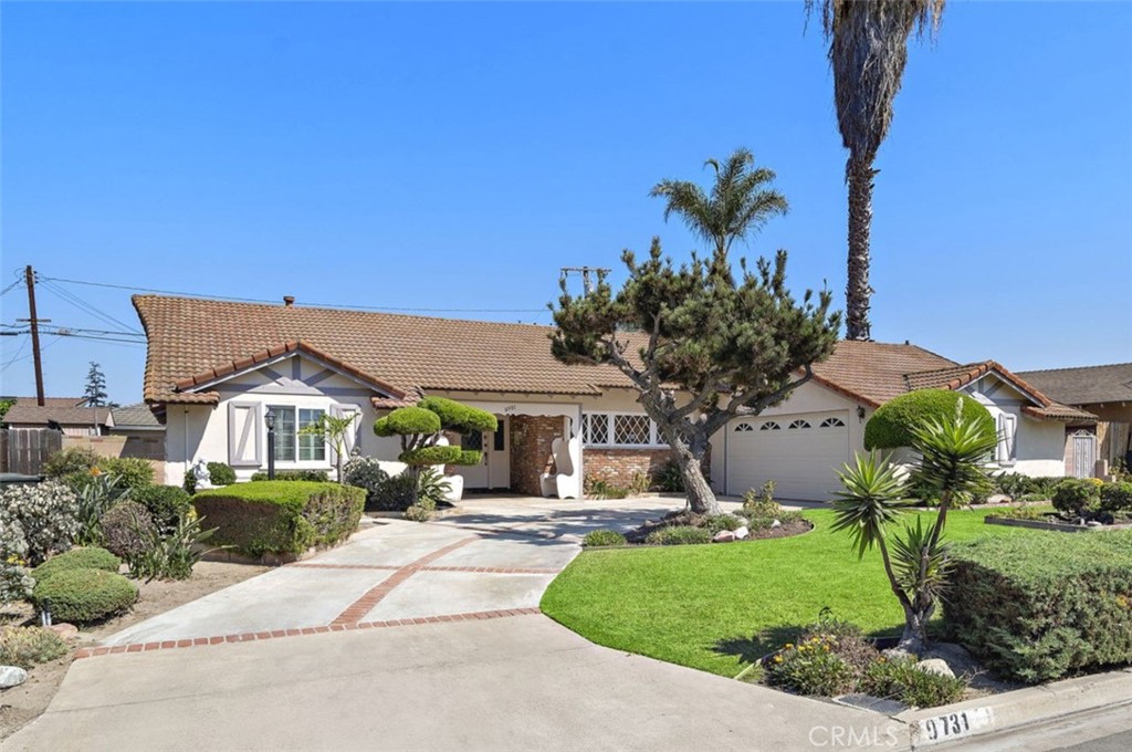 Charming single-level residence sits on an impressive 8,625 sq ft - 9731 Halekulani Drive, Garden Grove CA 92841 - photo 1