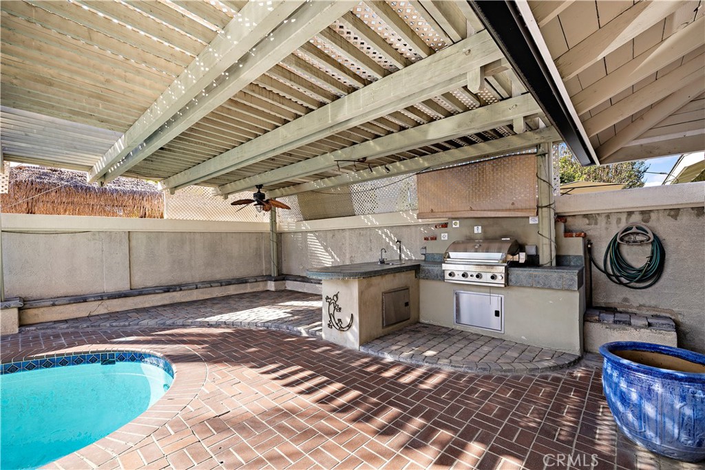 Outdoor grilling and island with room for a table and chairs for outdoor dining and entertaining. - 10212 Valley Forge, Huntington Beach CA 92646 - photo 12