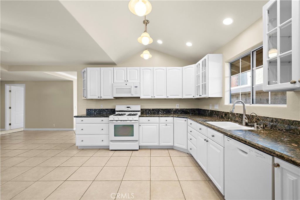 Kitchen view unstaged. - 10212 Valley Forge, Huntington Beach CA 92646 - photo 23