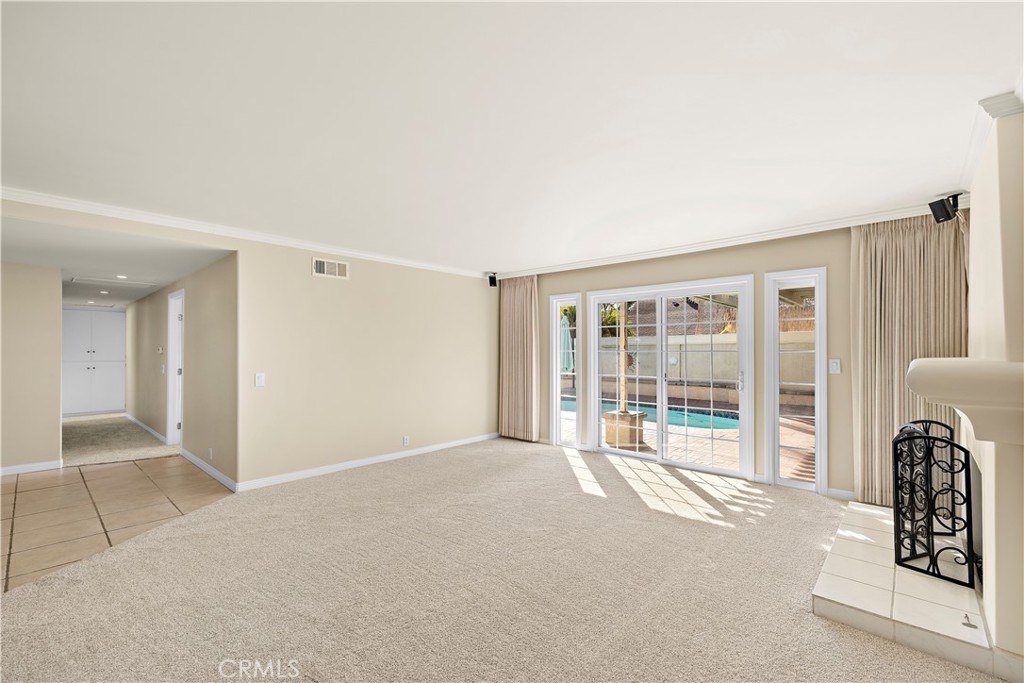 Living room unstaged. - 10212 Valley Forge, Huntington Beach CA 92646 - photo 29