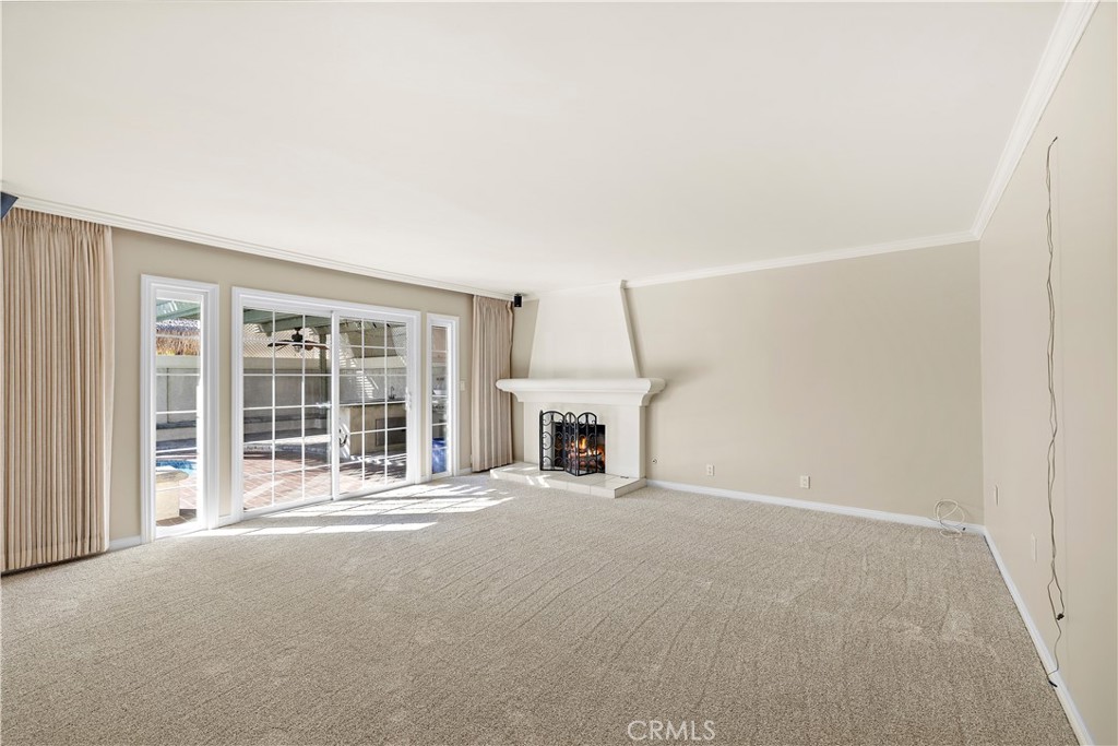 Living room unstaged. - 10212 Valley Forge, Huntington Beach CA 92646 - photo 30