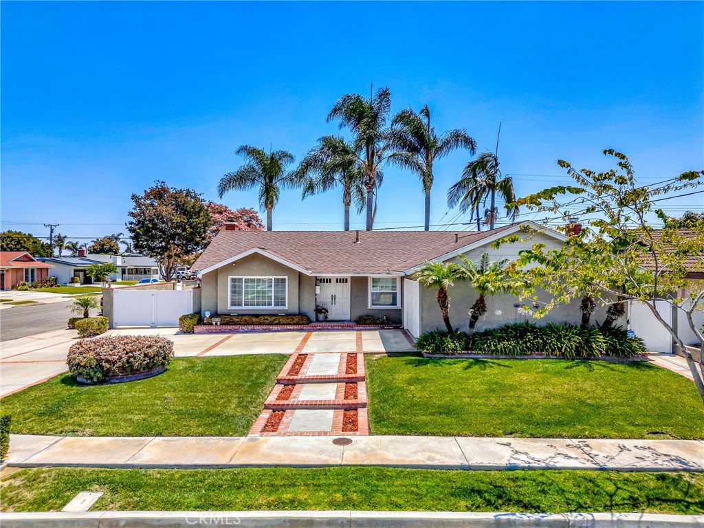 Welcome to 15392 Hanover Lane in Huntington Beach. - 15392 Hanover Lane, Huntington Beach CA 92647 - photo 1