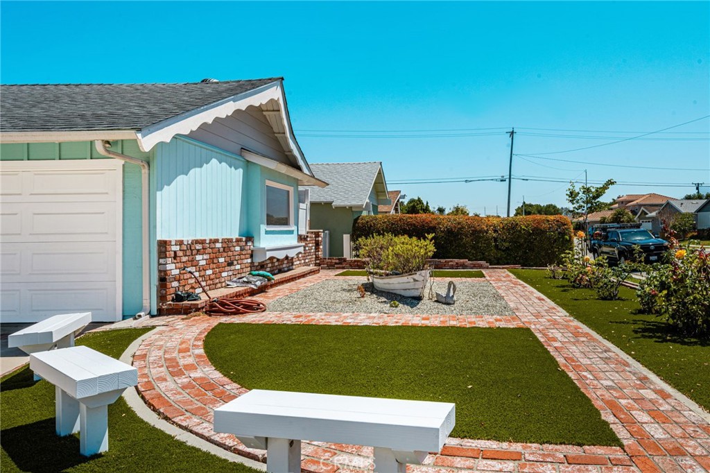 front side from driveway - 15732 Swan Lane, Huntington Beach CA 92649 - photo 19