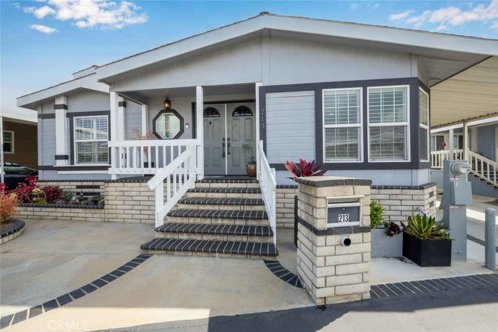 16222 Monterey Lane 213, Huntington Beach CA 92649 - photo 1