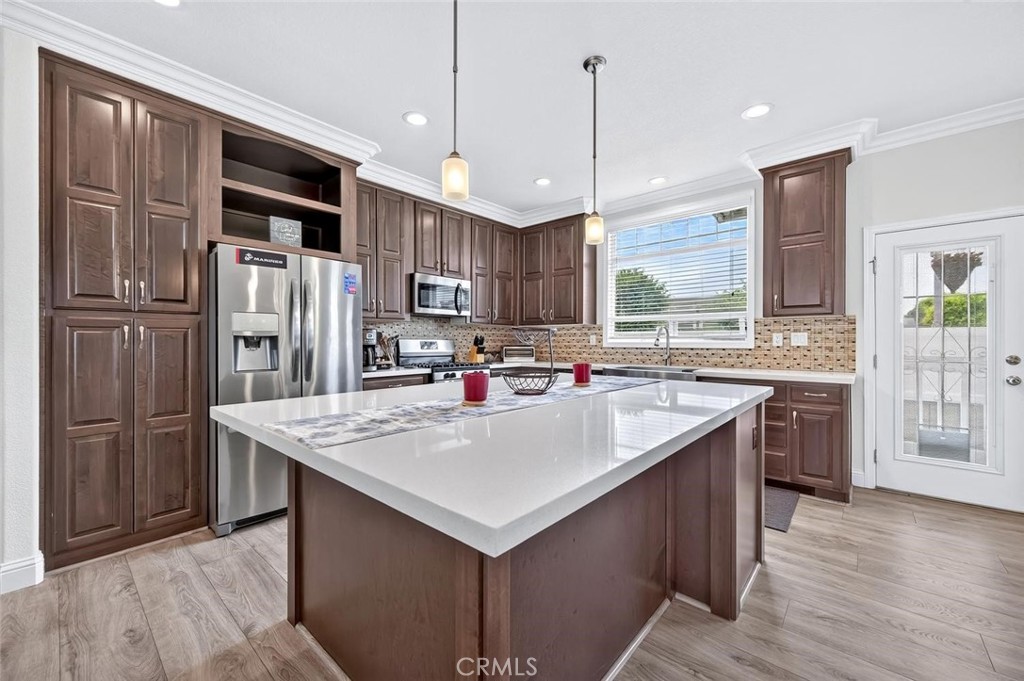 Kitchen island - 16444 Bolsa Chica Street 20, Huntington Beach CA 92649 - photo 9