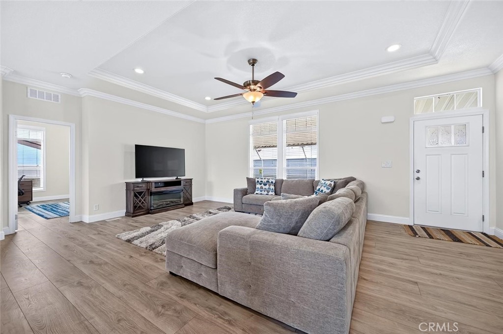 living room TV area - 16444 Bolsa Chica Street 20, Huntington Beach CA 92649 - photo 20