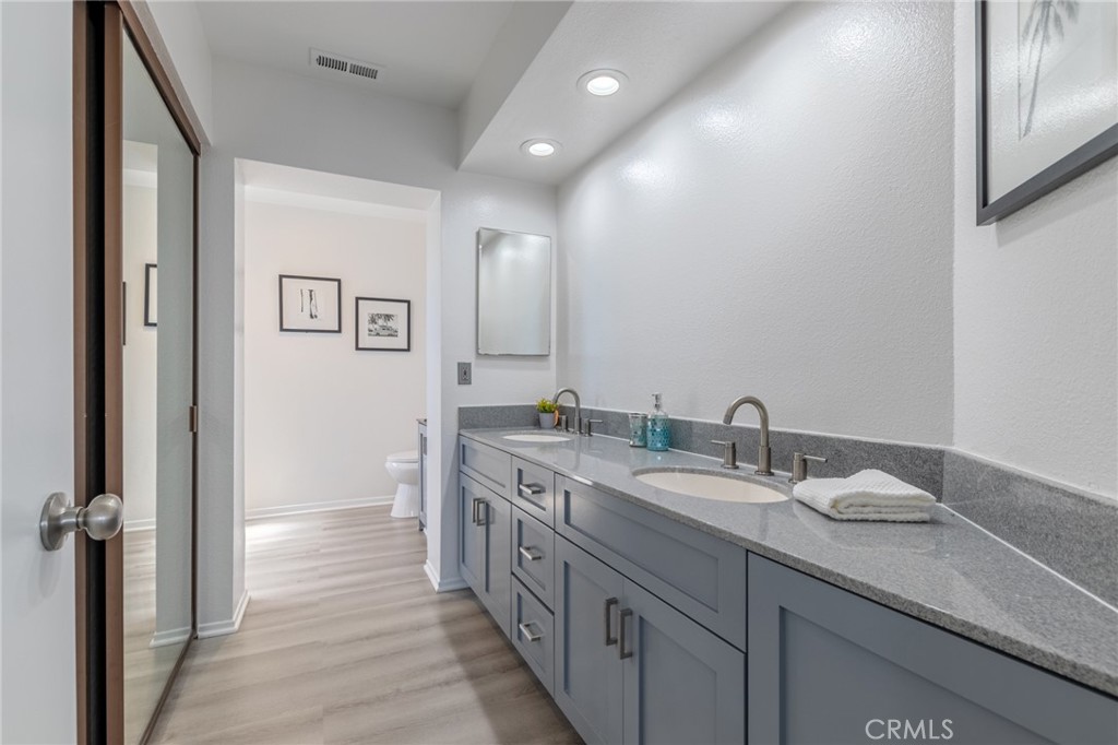 Dual Vanity, Walk-in closet, walk-in shower in Bath #1 - 16456 Germain 223, Huntington Beach CA 92649 - photo 12