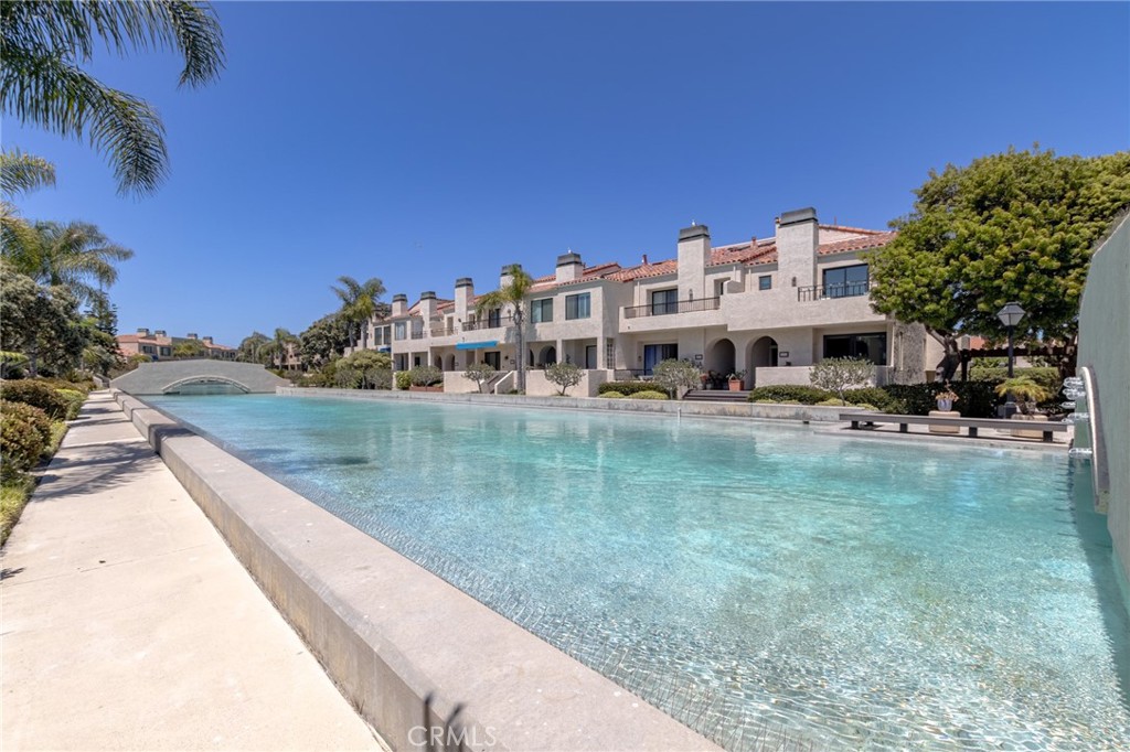Lagoon in the community - 16456 Germain 223, Huntington Beach CA 92649 - photo 19