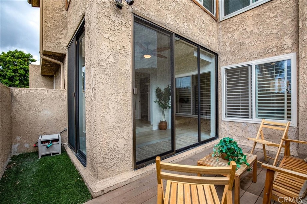 Living room patio - 16933 Bluewater, Huntington Beach CA 92649 - photo 1