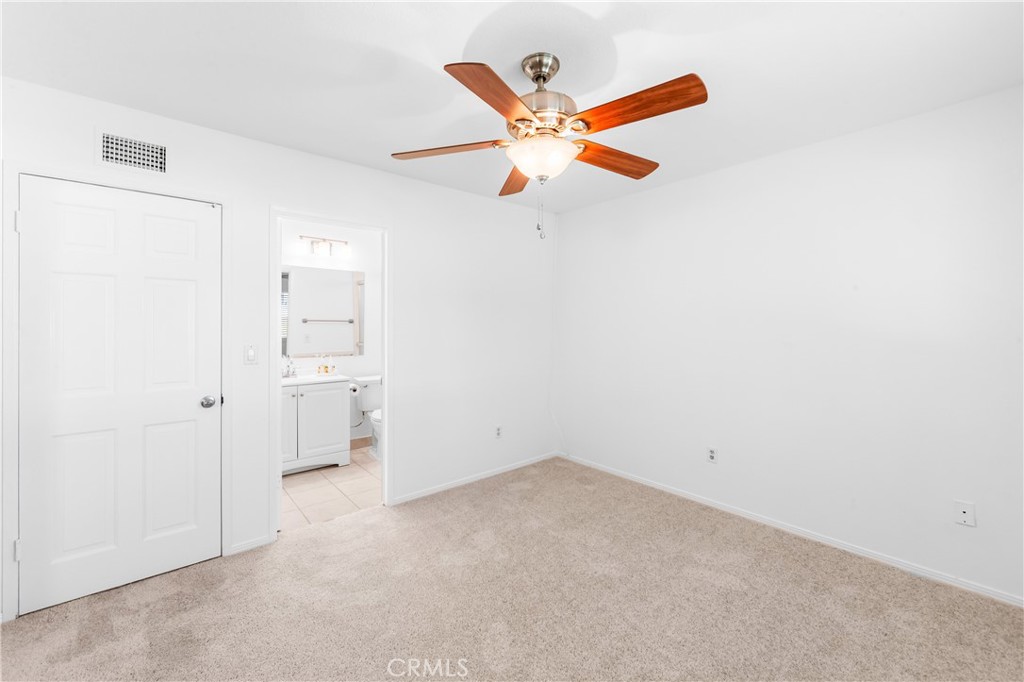 Primary bedroom has direct access to private bathroom. - 17042 Friml Lane, Huntington Beach CA 92649 - photo 32