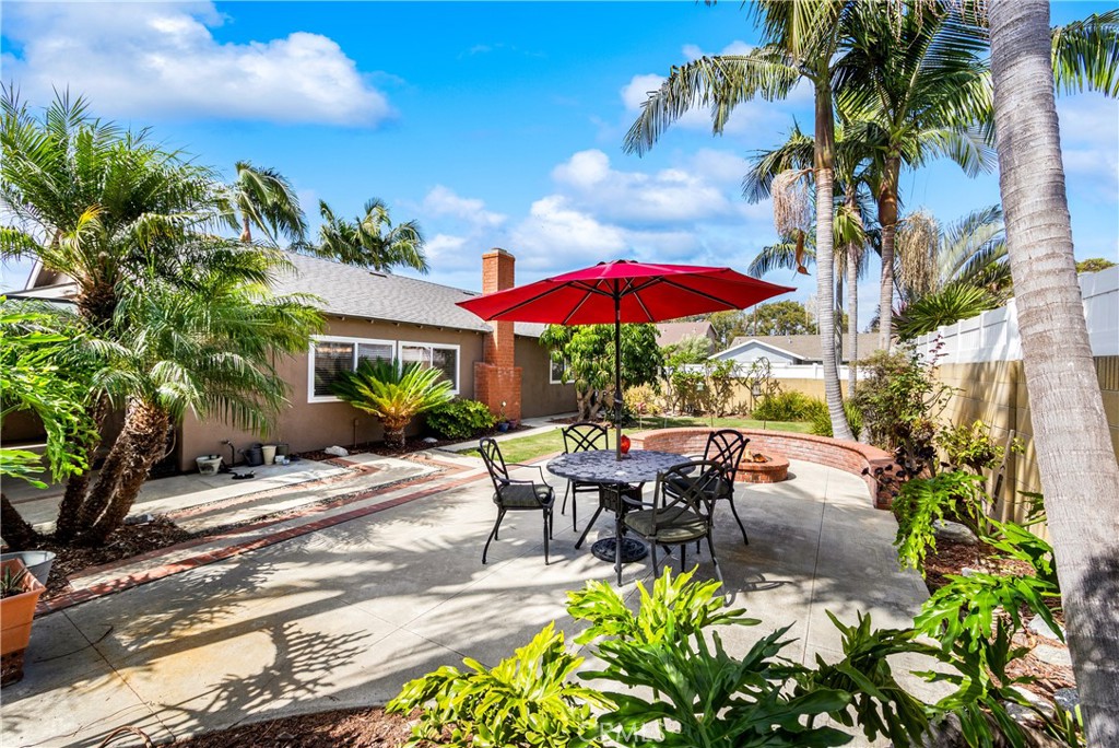 Tropical landscaping and spacious patio areas. - 17042 Friml Lane, Huntington Beach CA 92649 - photo 37