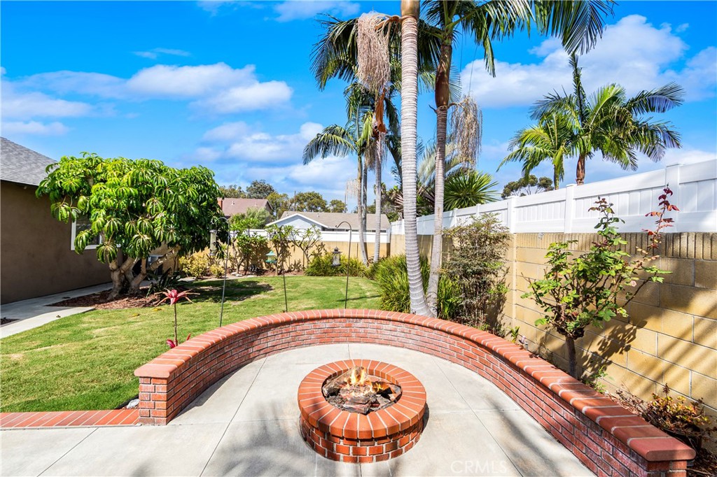 Firepit creates an attractive focal point for the backyard. - 17042 Friml Lane, Huntington Beach CA 92649 - photo 38