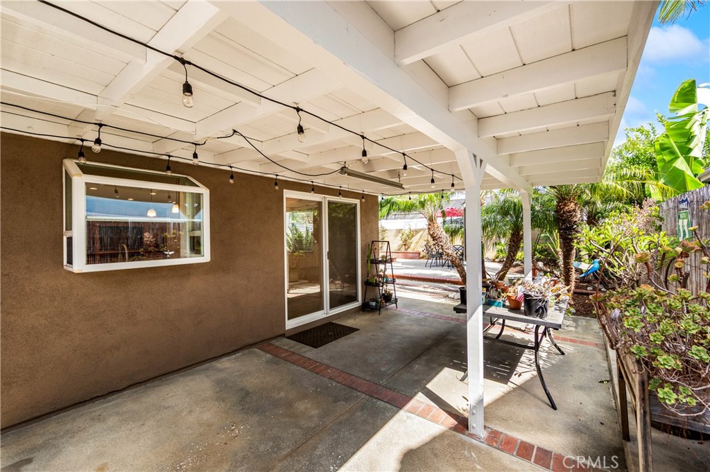 Covered outdoor area provides additional space for relaxing or entertaining. - 17042 Friml Lane, Huntington Beach CA 92649 - photo 40