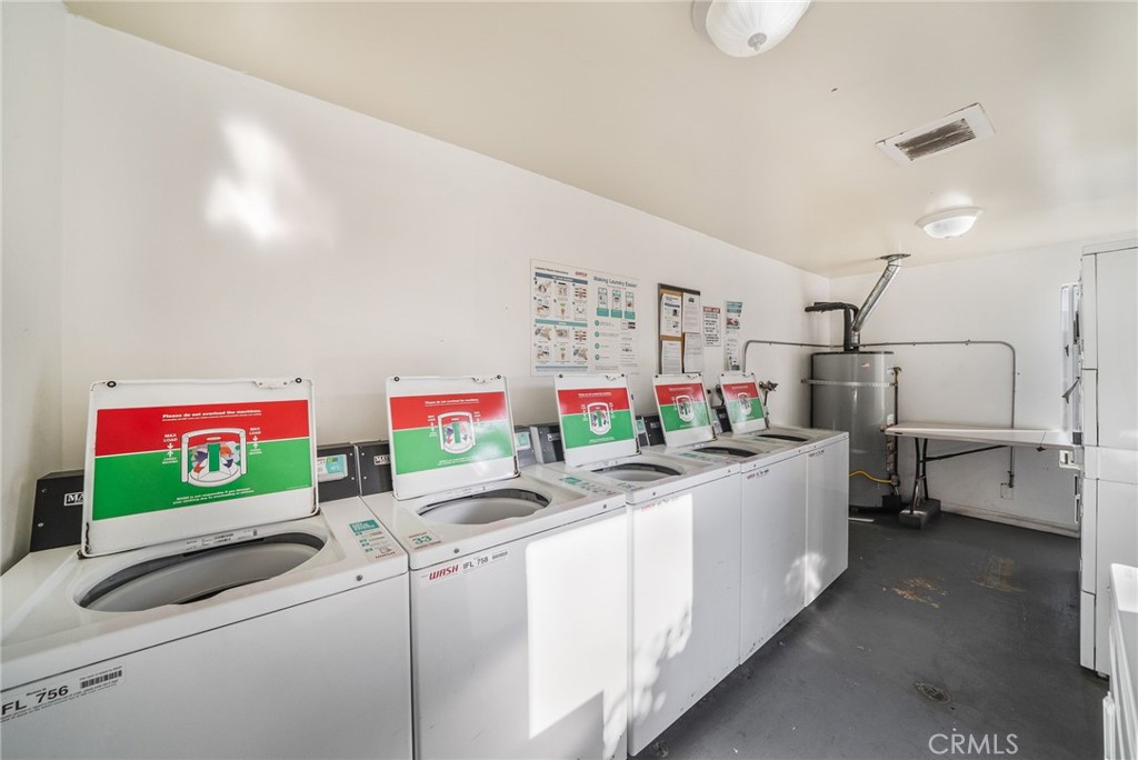 community laundry room - 17042 Pacific Coast Highway 201, Huntington Beach CA 92649 - photo 35