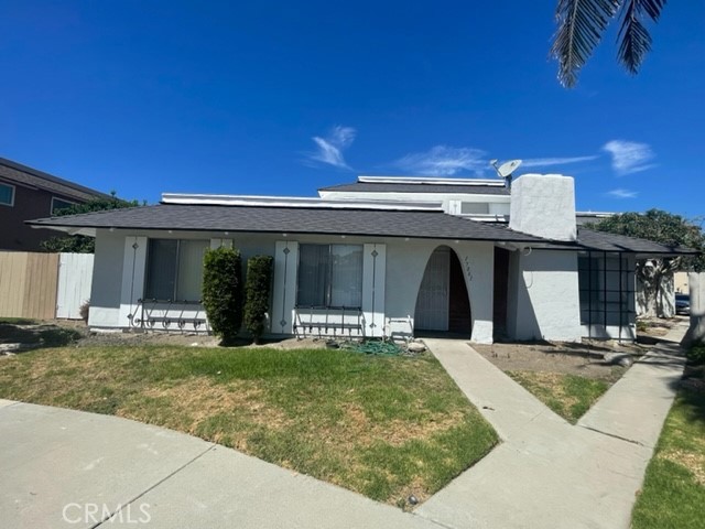 Unit A is all one level. - 17061 Grove Circle A, Huntington Beach CA 92647 - photo 1