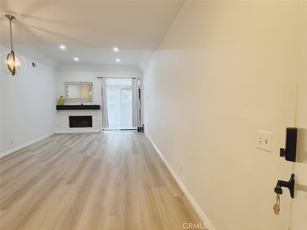 living room entry - 17191 Corbina Lane 102, Huntington Beach CA 92649 - photo 3